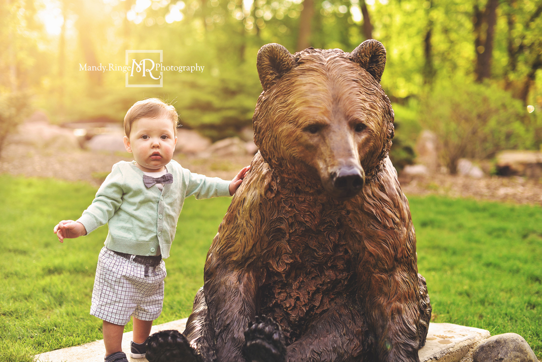 Spring family portraits // family of three, backlighting, bear statue, teal and navy // Mount St. Mary Park - St. Charles, IL // by Mandy Ringe Photography