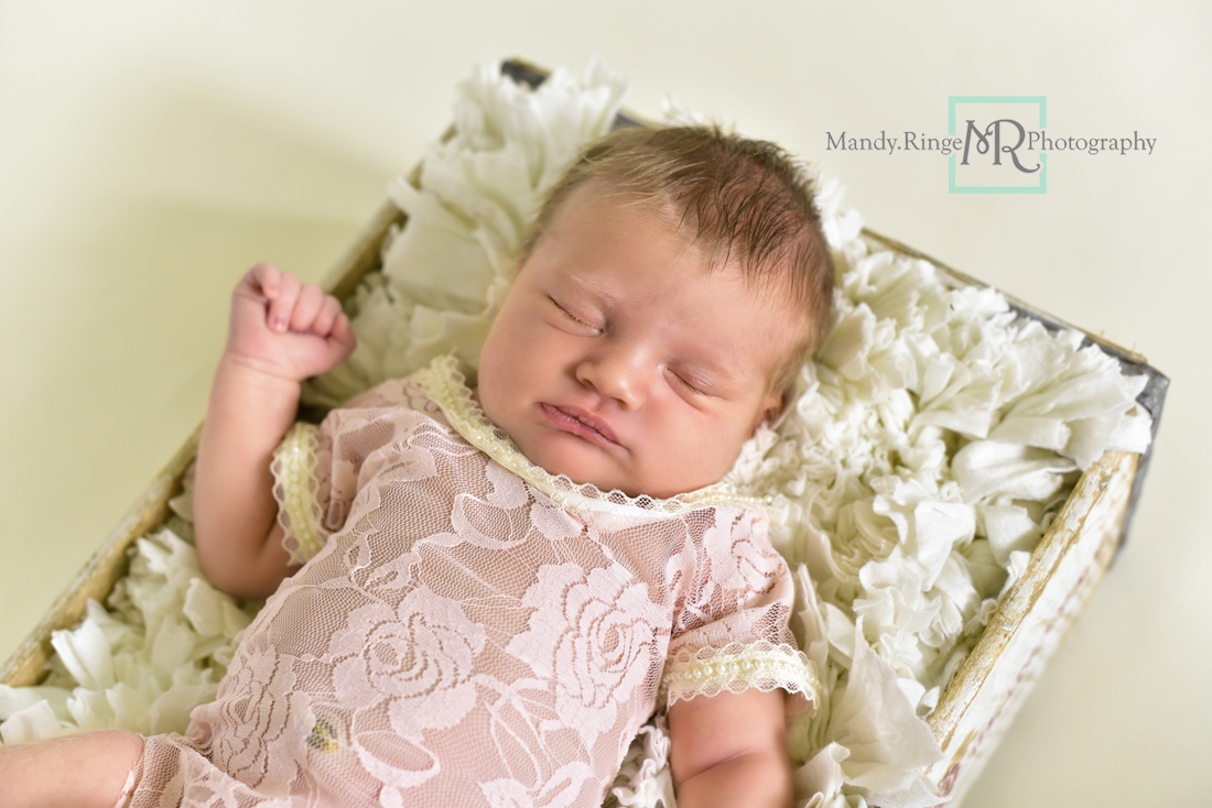 Newborn girl portraits // Vintage crate prop, white rag rug, pink lace outfit // Client's home - St Charles, IL // Mandy Ringe Photography