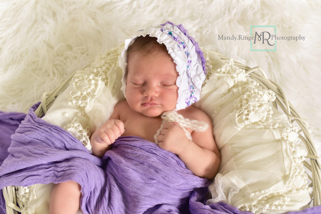 Newborn girl portraits // White woven bowl prop, vintage lace shawl layer, ivory, white, purple scarf, bonnett // Client's home - St Charles, IL // Mandy Ringe Photography