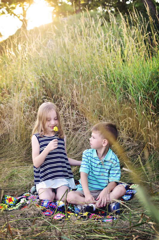 Sibling portraits taken at Fox River Marina in Barrington, IL by Mandy Ringe Photography
