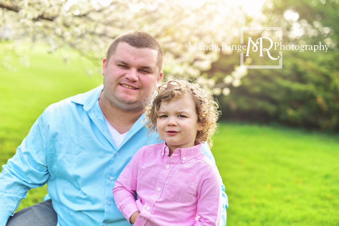 Spring family portraits // crab apple tree, pink and blue, outdoors, family of three, white flowers // Mount St. Mary Park - St Charles, IL // by Mandy Ringe Photography